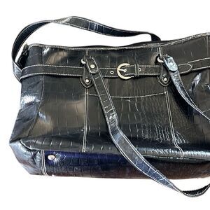 No brand well loved computer bag.